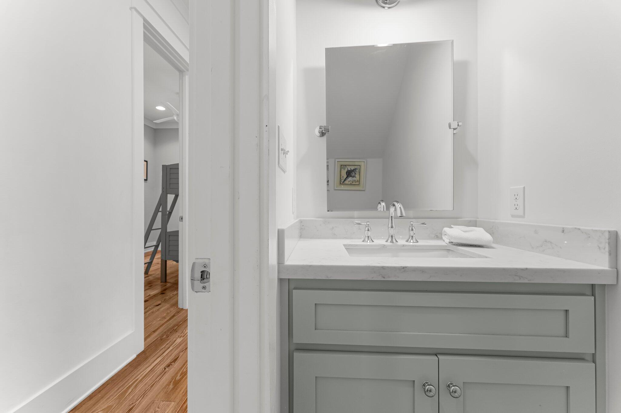 515 Seacrest Drive Inlet Beach, FL 32461 - Photo 32 of 62 a bathroom with a sink and a mirror