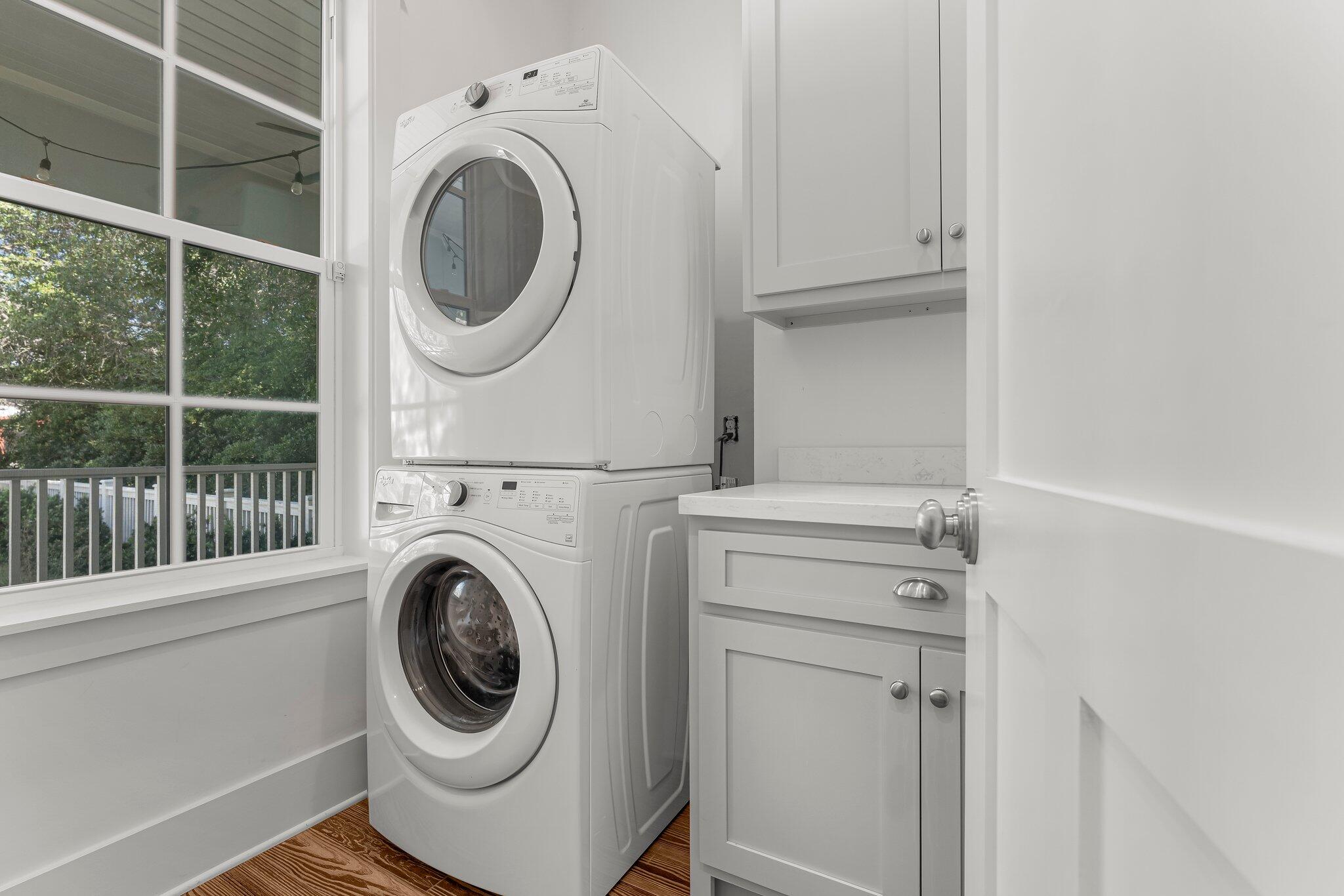 515 Seacrest Drive Inlet Beach, FL 32461 - Photo 36 of 62 a utility room with dryer and washer