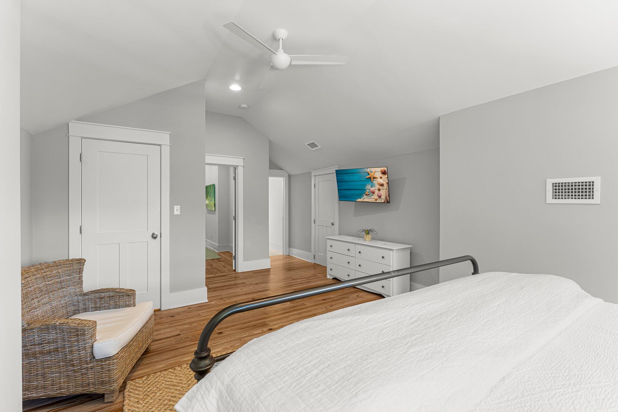 515 Seacrest Drive Inlet Beach, FL 32461 - Photo 38 of 62 a bedroom with a bed and a potted plant