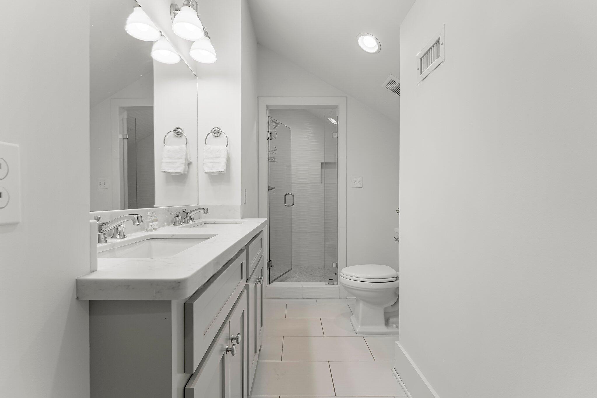 515 Seacrest Drive Inlet Beach, FL 32461 - Photo 39 of 62 a bathroom with a sink a toilet and a mirror