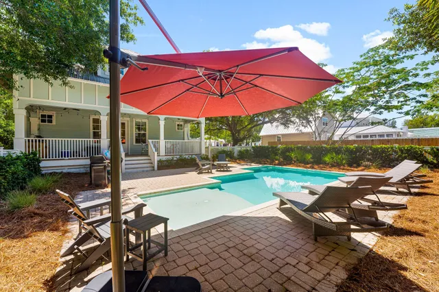 a kitchen with counter top space sink and center island
