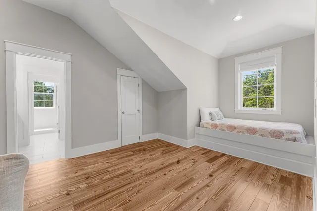 a front view of a house with a yard porch and outdoor seating