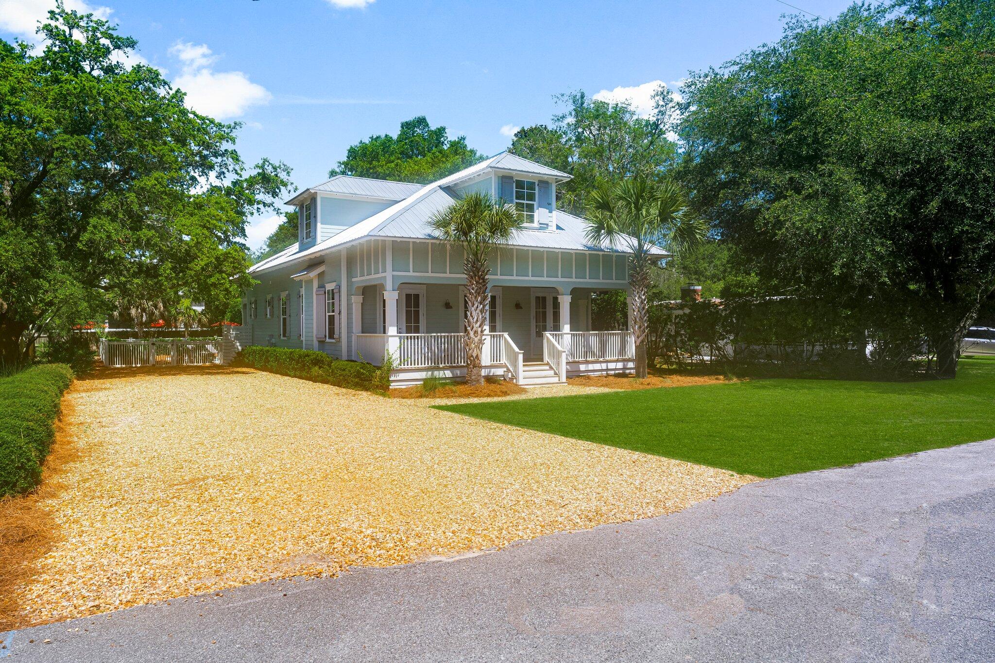 515 Seacrest Drive Inlet Beach, FL 32461 - Photo 49 of 62 a front view of house with yard and green space