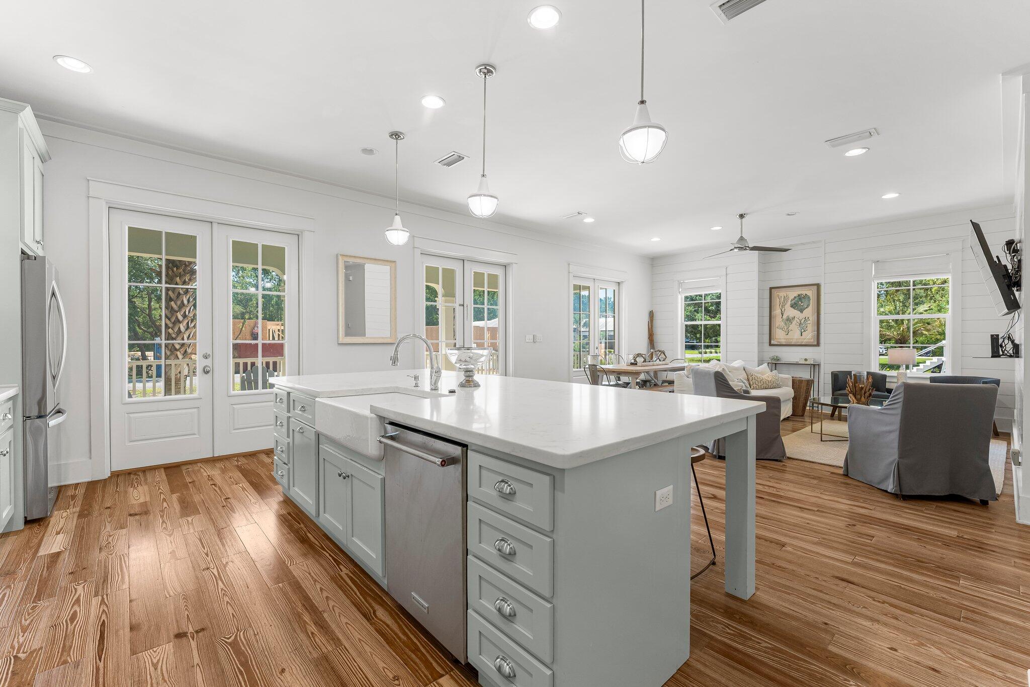 515 Seacrest Drive Inlet Beach, FL 32461 - Photo 6 of 62 a kitchen with counter top space sink and center island