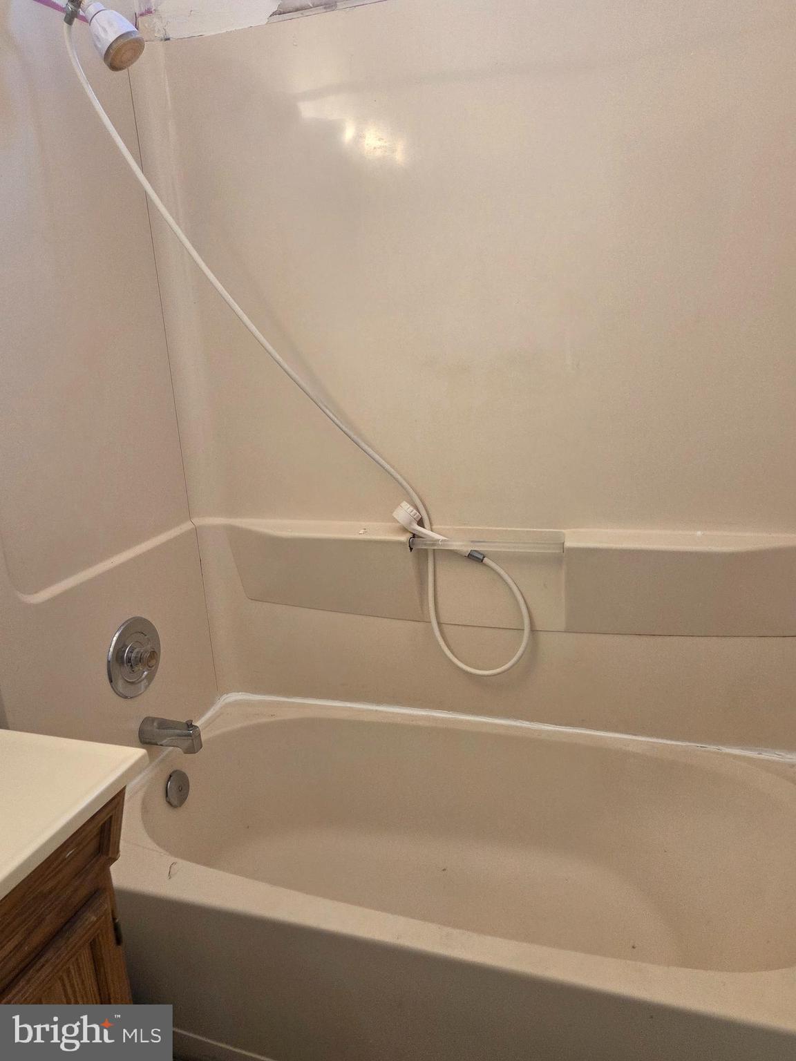 5706 Mitchell Road Levittown, PA 19057 - Photo 3 of 7 a bathroom with a bath tub