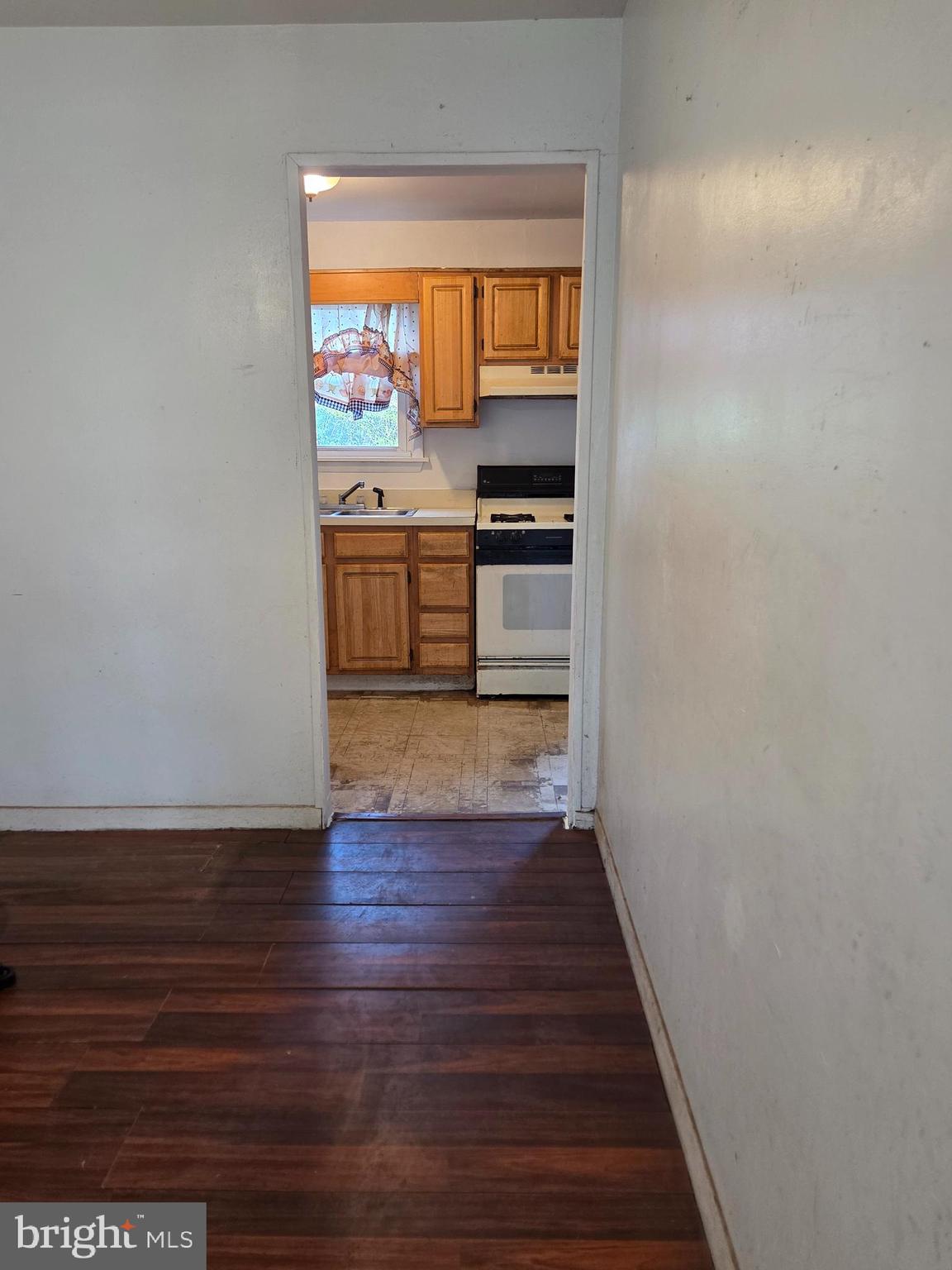 5706 Mitchell Road Levittown, PA 19057 - Photo 5 of 7 a view of kitchen with wooden floor
