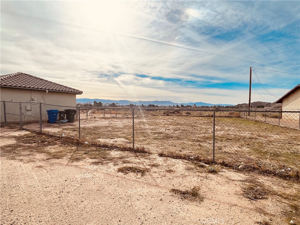 20891 Thunderbird Road Apple Valley, CA 92307 - Photo 3 of 45 a view of a lake with a beach
