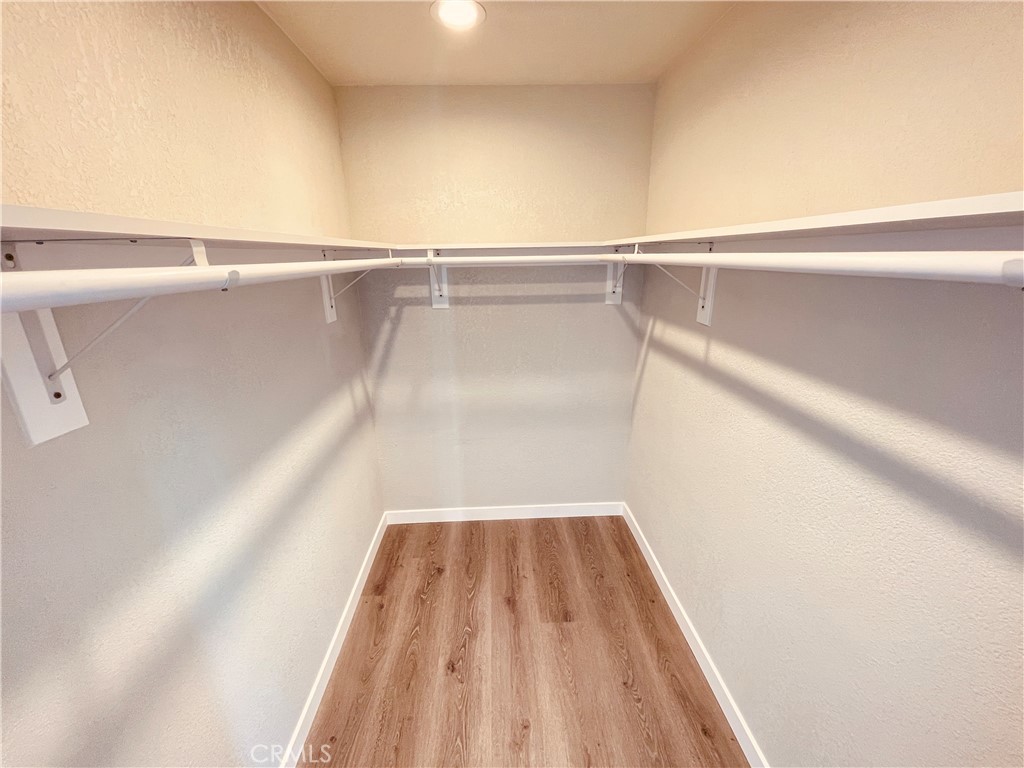 20891 Thunderbird Road Apple Valley, CA 92307 - Photo 33 of 45 a view of a room with racks on the wall