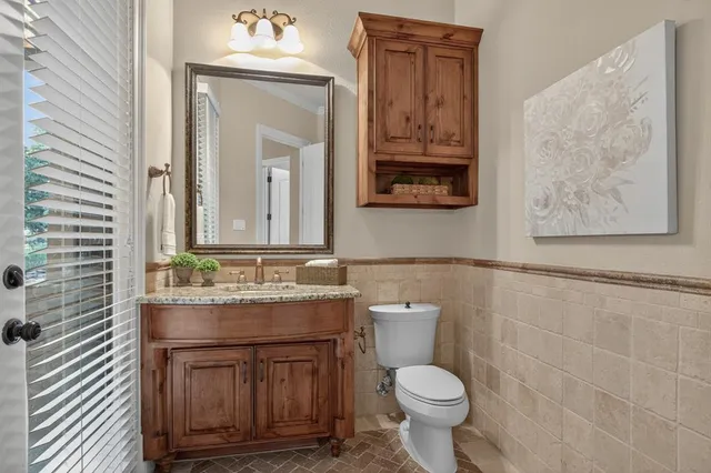 a kitchen with a stove and refrigerator