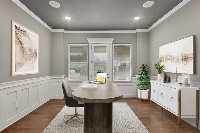 a large bathroom with a granite countertop sink a toilet a mirror and shower
