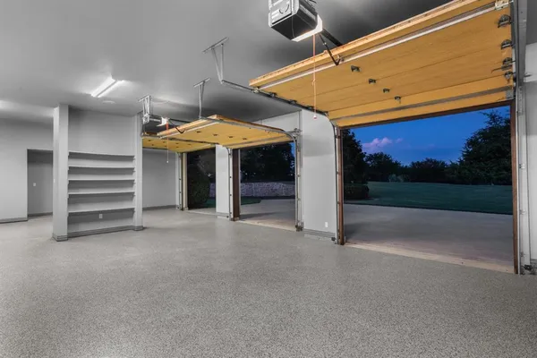 a view of a fireplace with a ceiling fan
