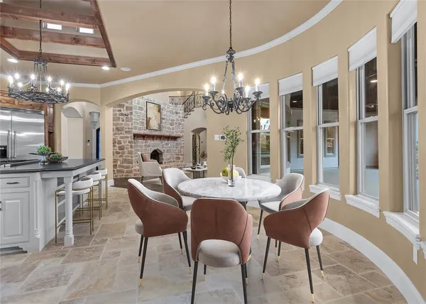 a kitchen with stainless steel appliances a sink and a refrigerator