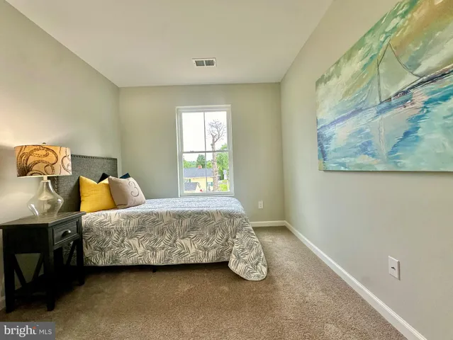 a bathroom with a toilet a sink and a bathtub