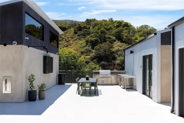 a view of a house with a patio