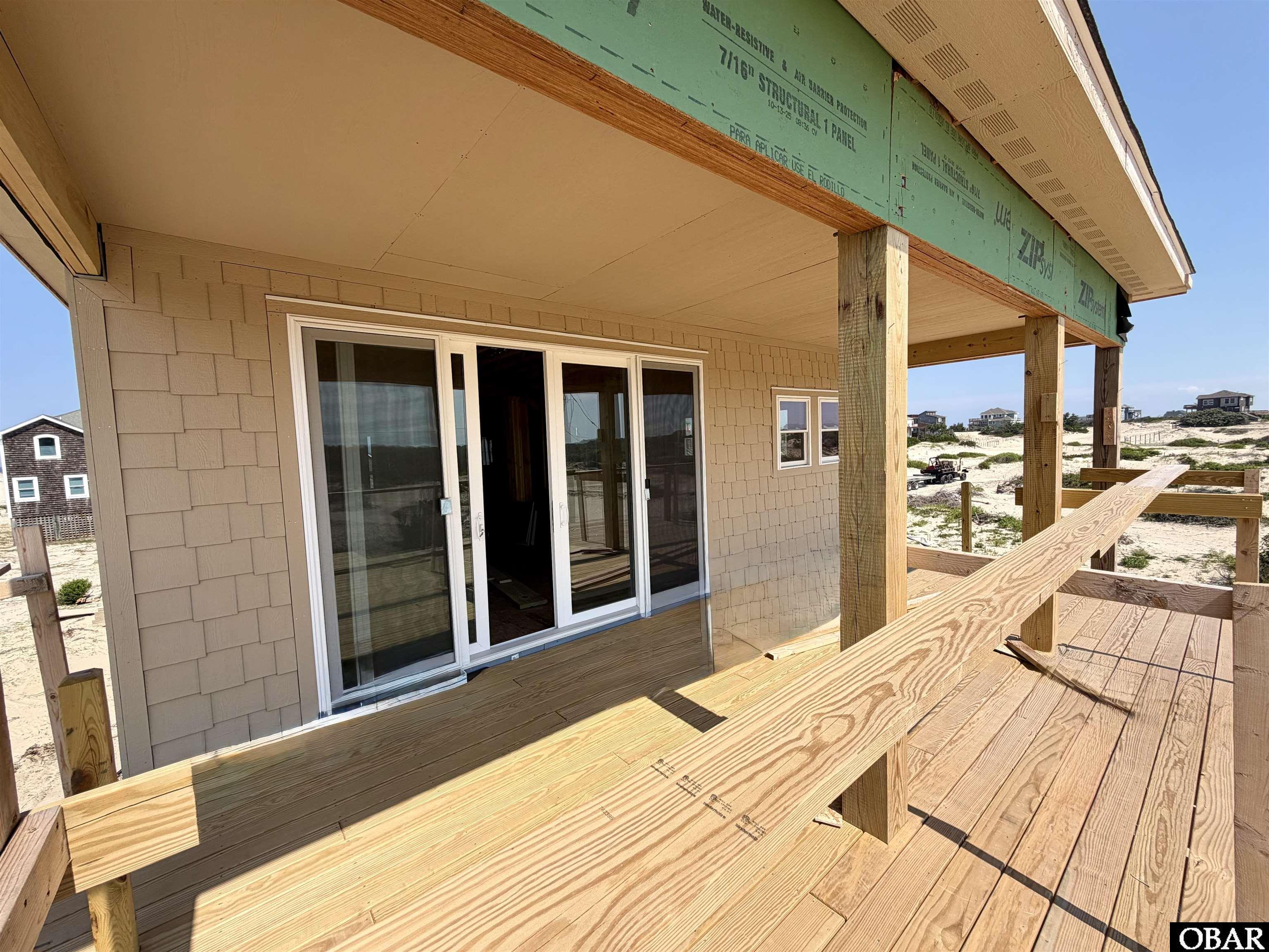 1590 Sandfiddler Road Corolla, NC 27927 - Photo 26 of 39 2nd floor W deck