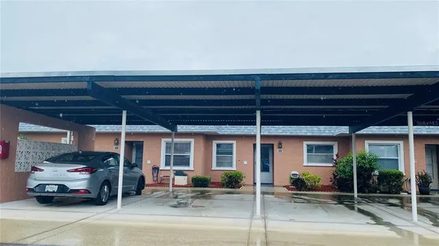 a car parked in front of a building