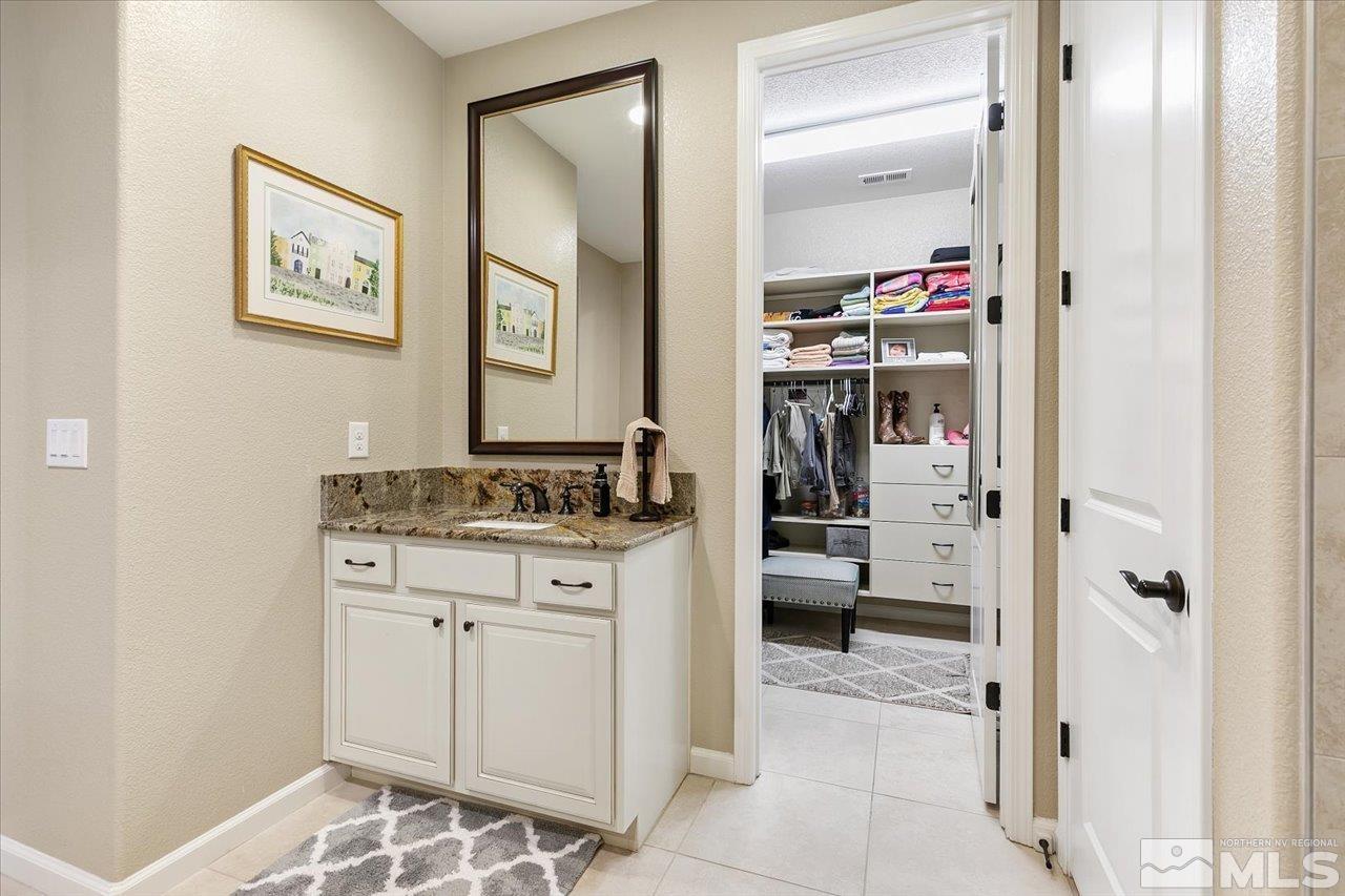 2280 Trakehner Lane Reno, NV 89521 - Photo 14 of 24 a view of a bathroom from the hallway