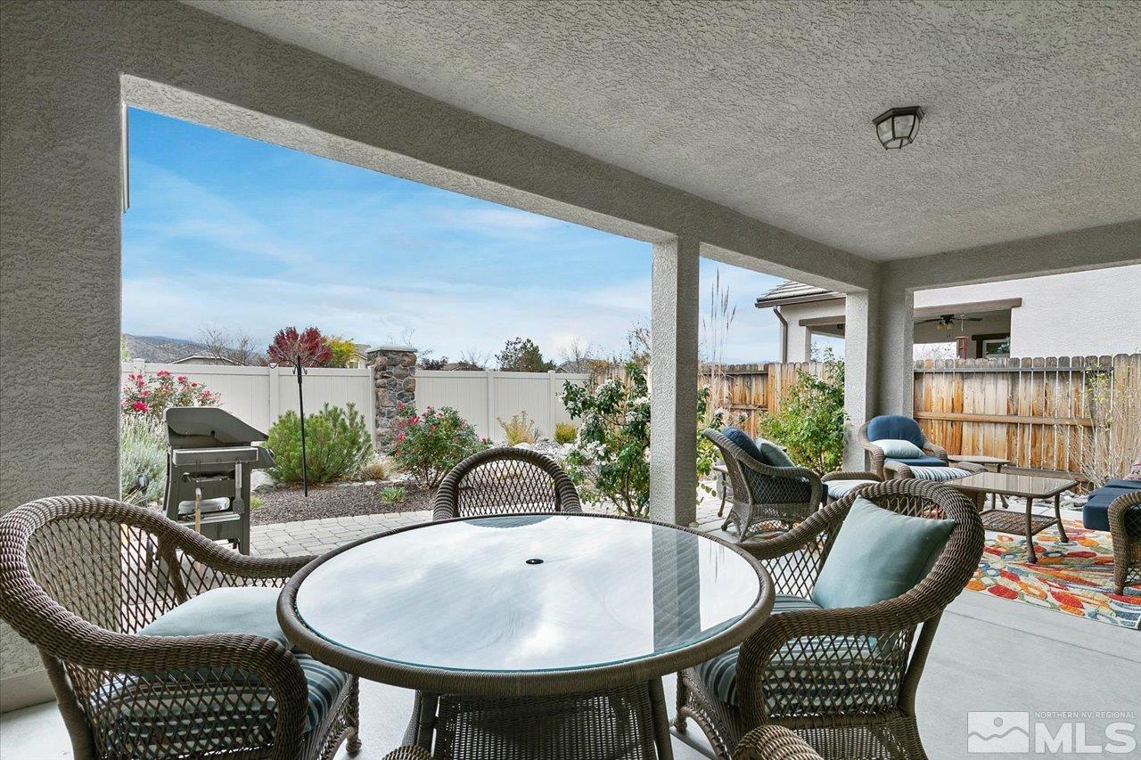 2280 Trakehner Lane Reno, NV 89521 - Photo 18 of 24 a view of a dining room with furniture window and outside view
