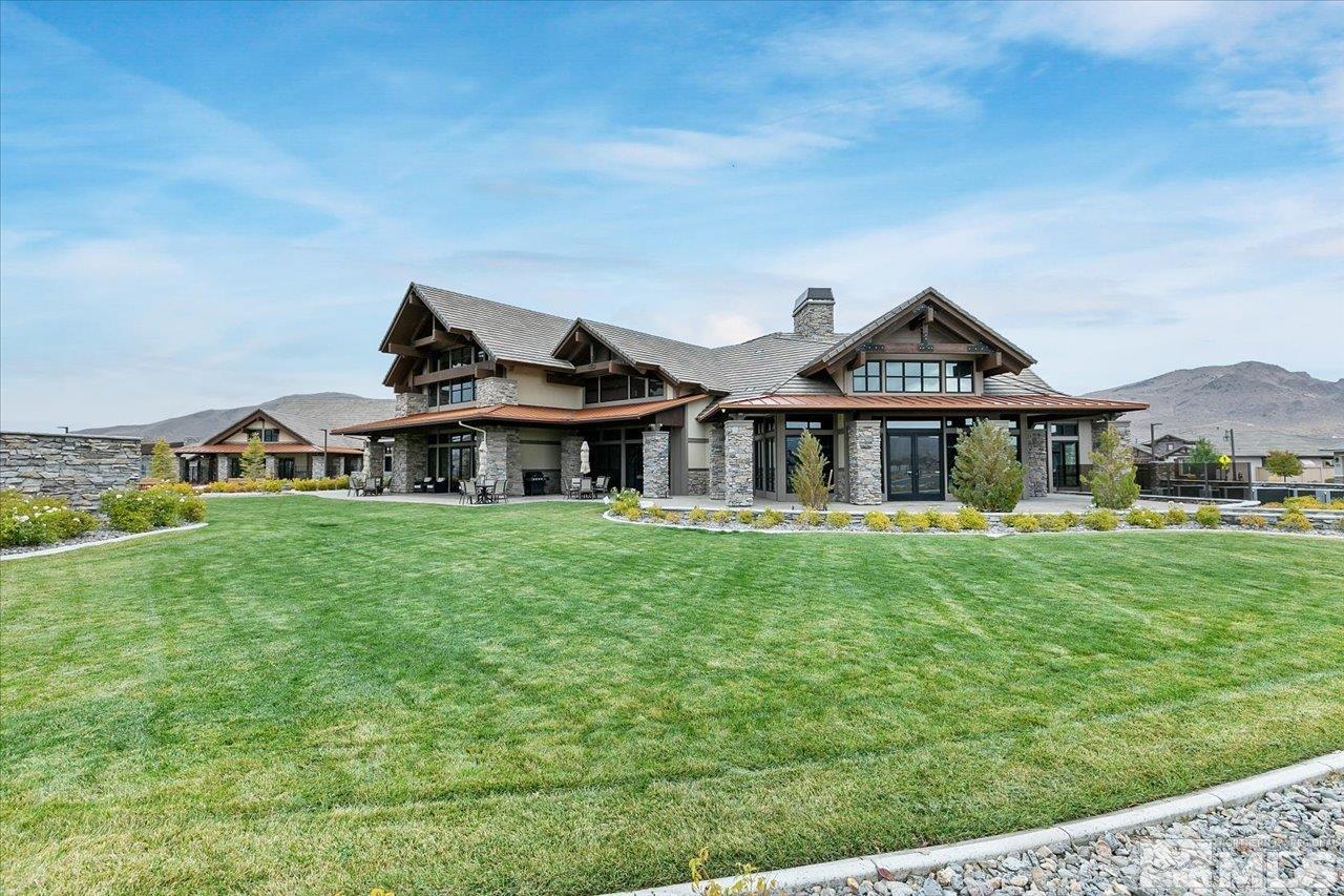 2280 Trakehner Lane Reno, NV 89521 - Photo 21 of 24 a front view of a house with a garden