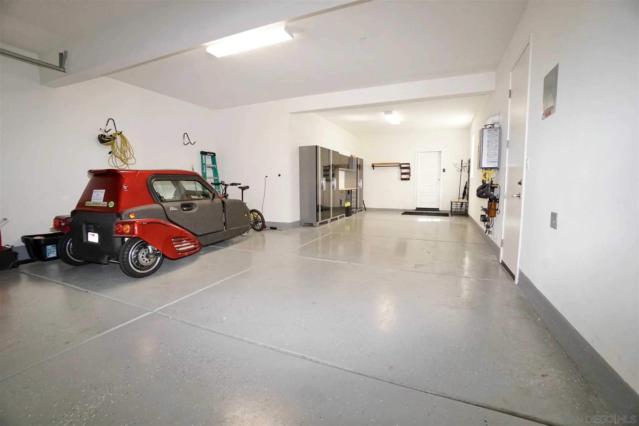 8831 Weston Road Santee, CA 92071 - Photo 17 of 25 a view of a car in garage