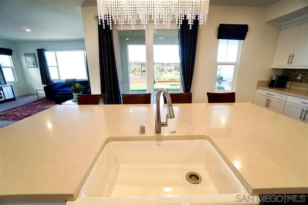 8831 Weston Road Santee, CA 92071 - Photo 7 of 25 a bathroom with a tub a sink and a large window