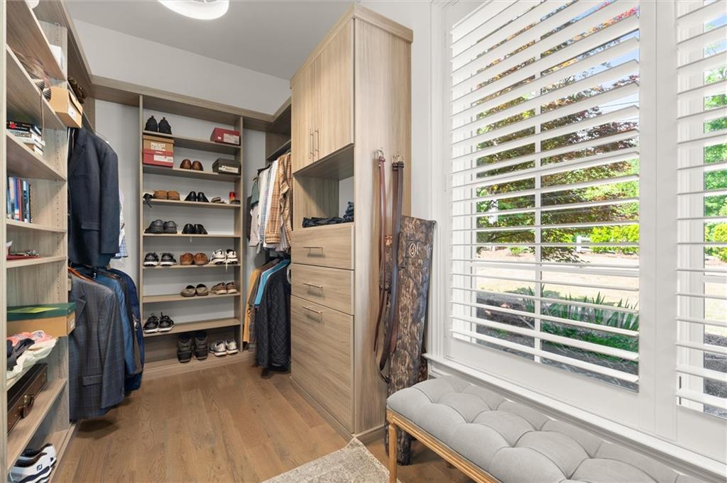 4240 Paces Ferry Road Southeast Atlanta, GA 30339 - Photo 35 of 66 a view of walk in closet with clothes and shoes