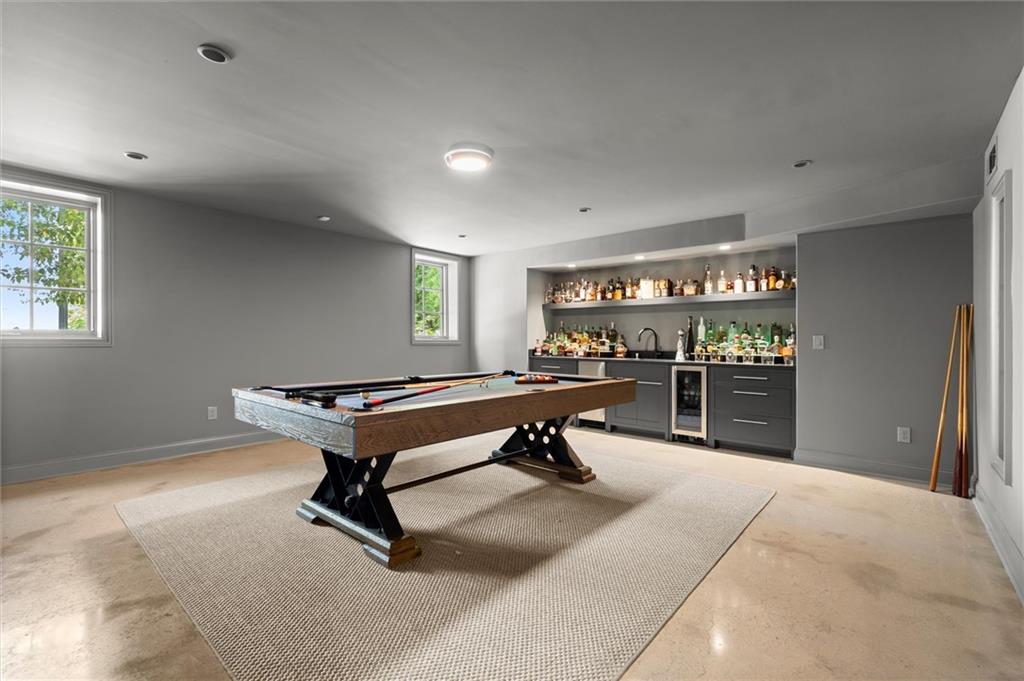 4240 Paces Ferry Road Southeast Atlanta, GA 30339 - Photo 39 of 66 a room with pool table and windows