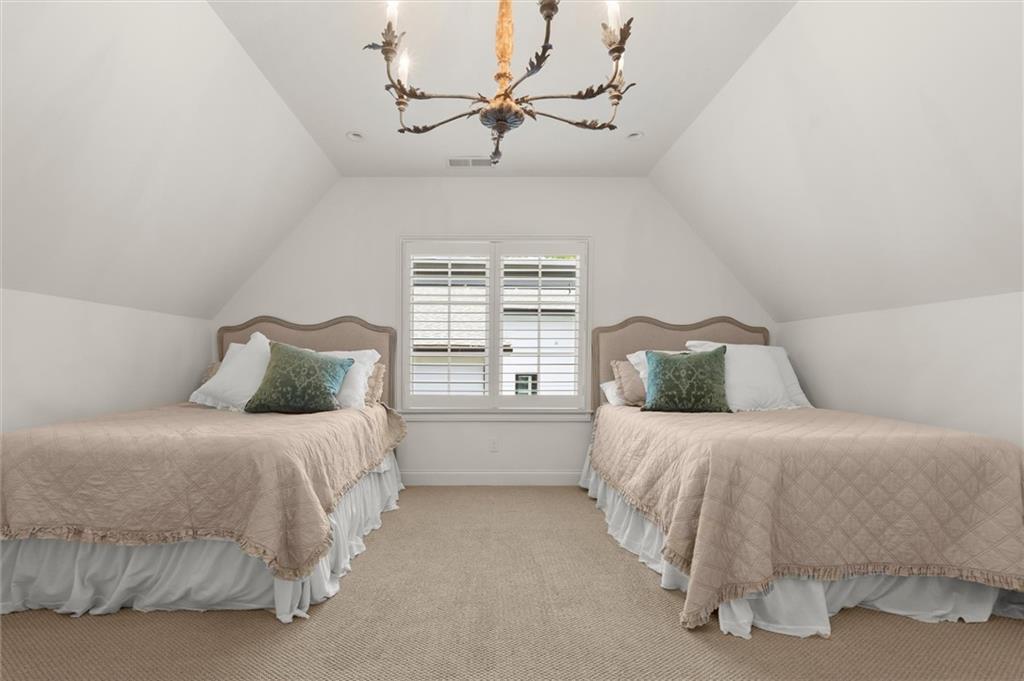 4240 Paces Ferry Road Southeast Atlanta, GA 30339 - Photo 56 of 66 a bedroom with a bed and window