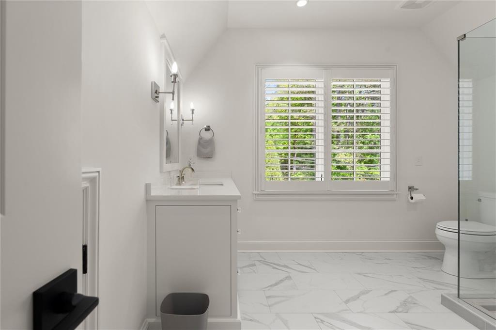 4240 Paces Ferry Road Southeast Atlanta, GA 30339 - Photo 58 of 66 a bathroom with a sink and a toilet