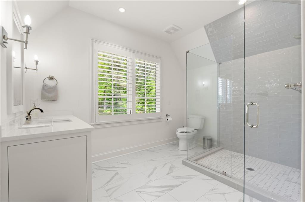 4240 Paces Ferry Road Southeast Atlanta, GA 30339 - Photo 59 of 66 a bathroom with a sink toilet and shower