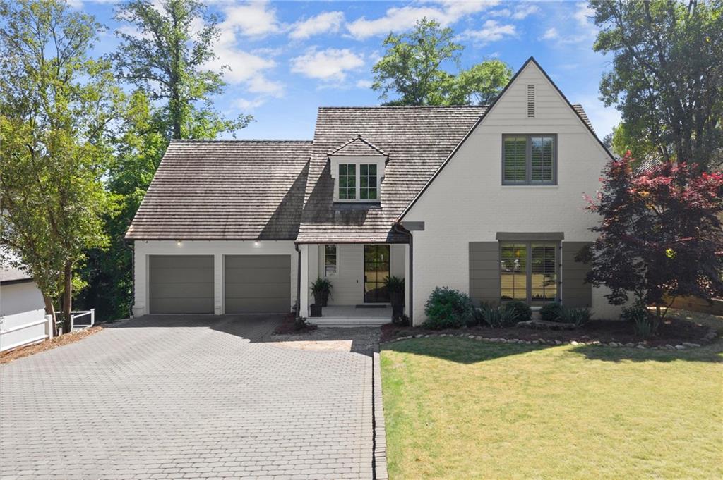 4240 Paces Ferry Road Southeast Atlanta, GA 30339 - Photo 64 of 66 a front view of a house with yard