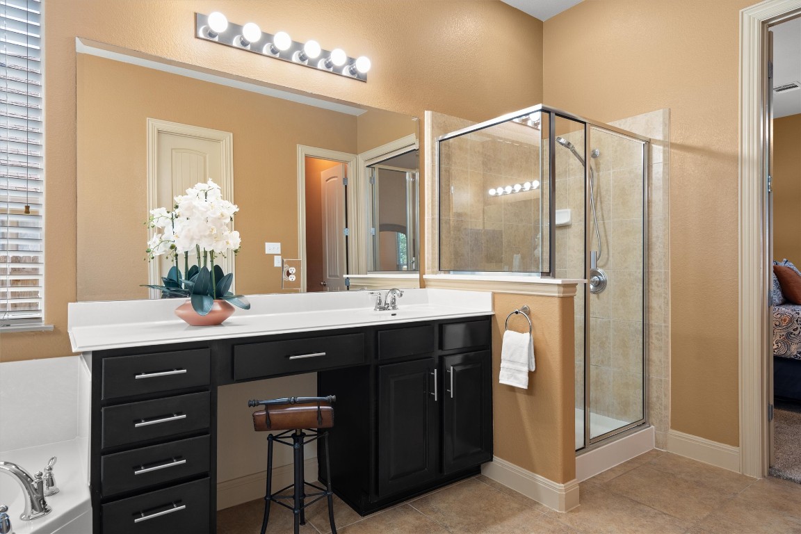 1425 Naranjo Drive Georgetown, TX 78628 - Photo 38 of 38 a bathroom with a sink double vanity and a mirror
