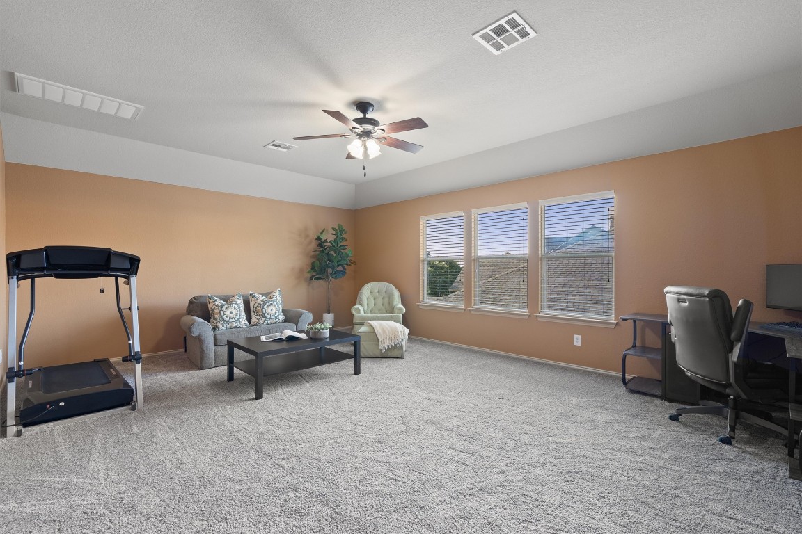 1425 Naranjo Drive Georgetown, TX 78628 - Photo 19 of 38 a living room with furniture and a window