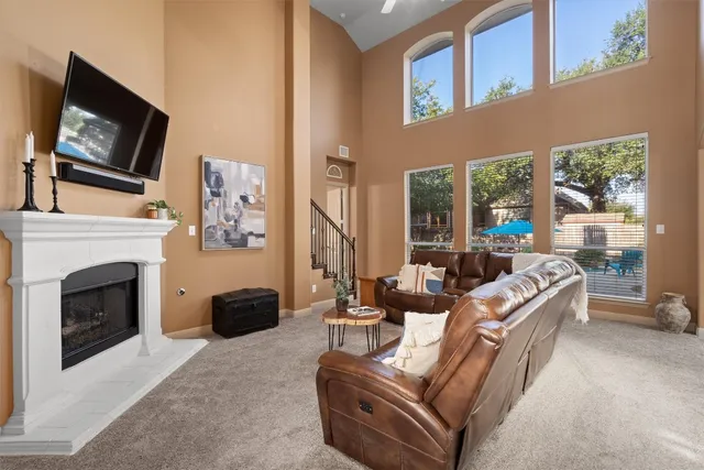 a view of a room that has a door and a mirror