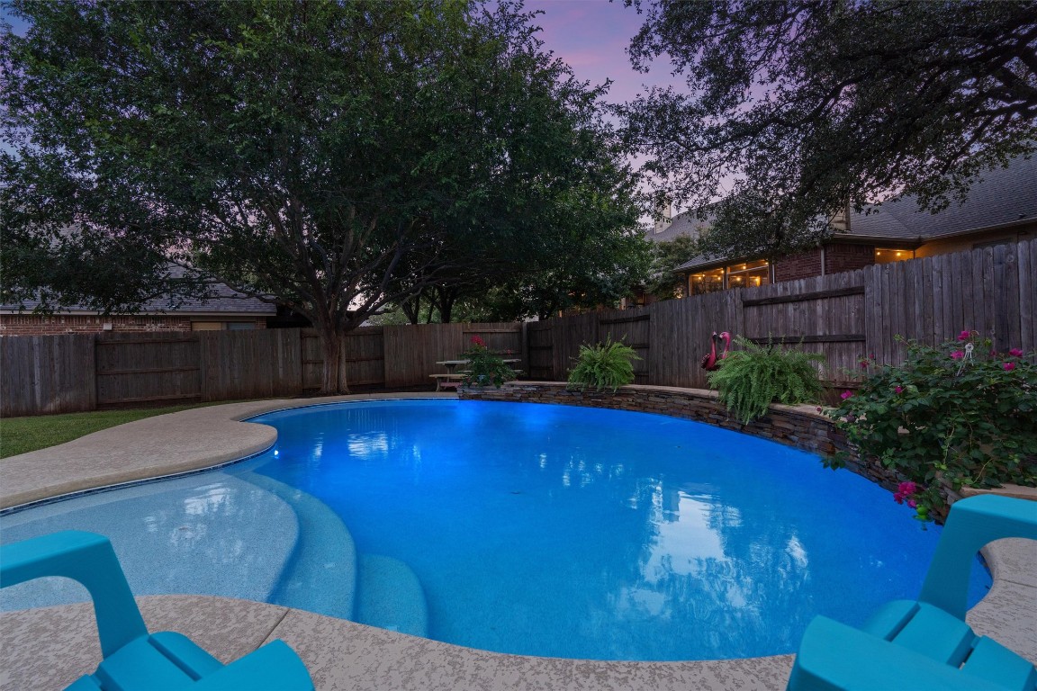 1425 Naranjo Drive Georgetown, TX 78628 - Photo 29 of 38 Backyard paradise: sparkling custom pool with peaceful fountain