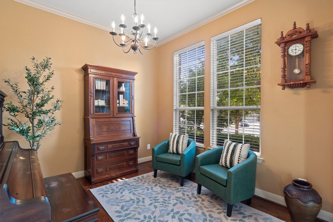 1425 Naranjo Drive Georgetown, TX 78628 - Photo 8 of 38 a living room with furniture and a potted plant