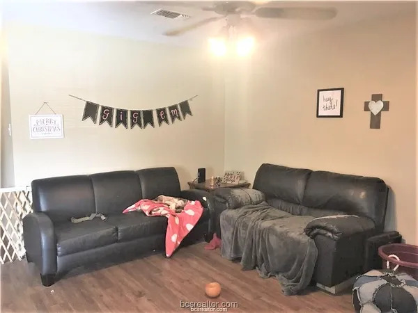 a living room with furniture and a couch