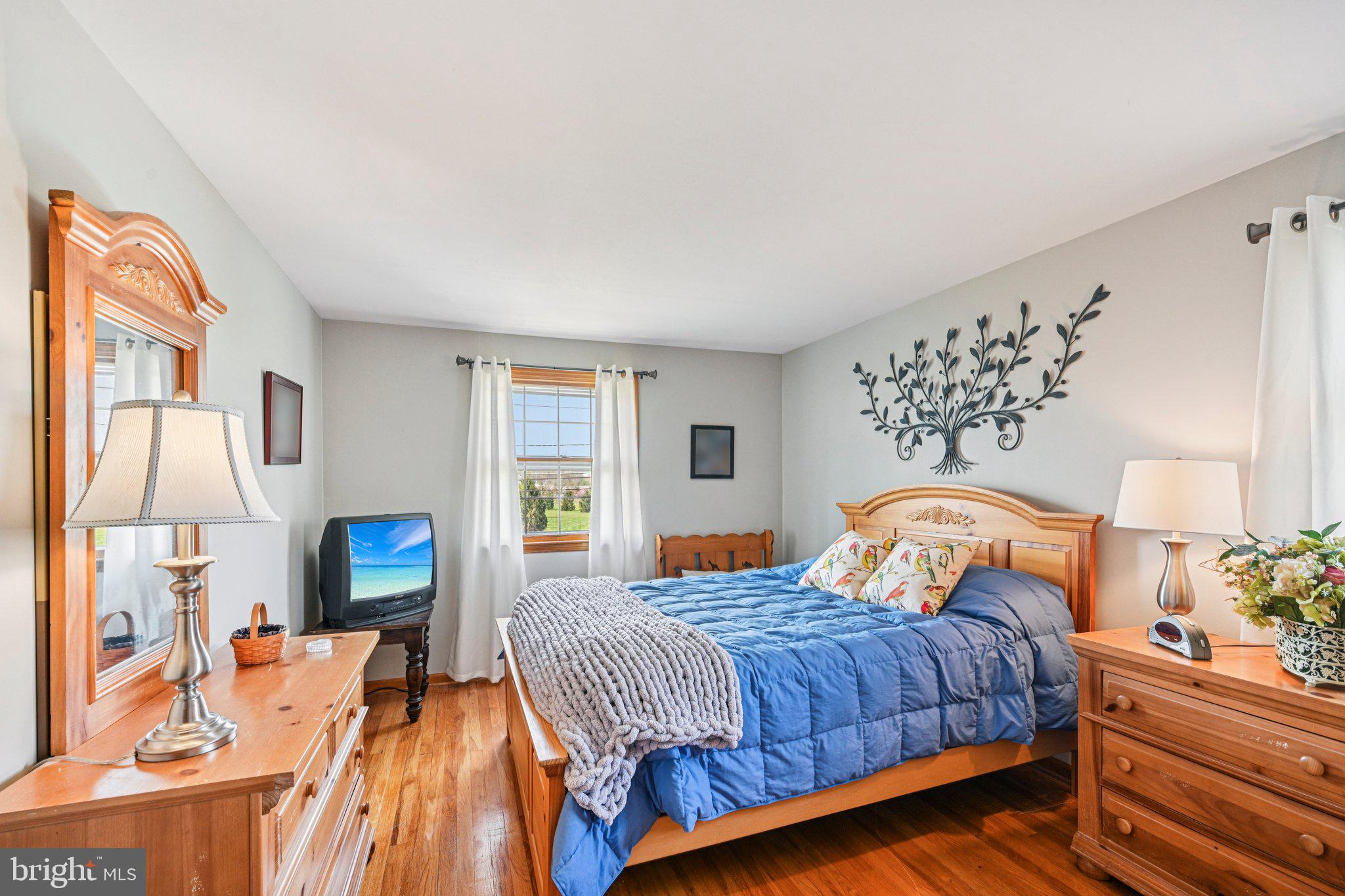 25618 Mt Pleasant Road Columbus, NJ 08022 - Photo 30 of 61 a bedroom with a bed and lamp on the dresser