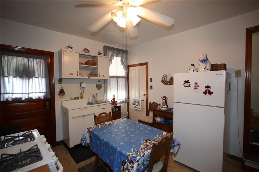 200 McKeesport Road Elizabeth, PA 15037 - Photo 3 of 25 Nice 12x12 Eat-in Kitchen w/ Ceiling Fan Light w/ Door to Covered Back Porch