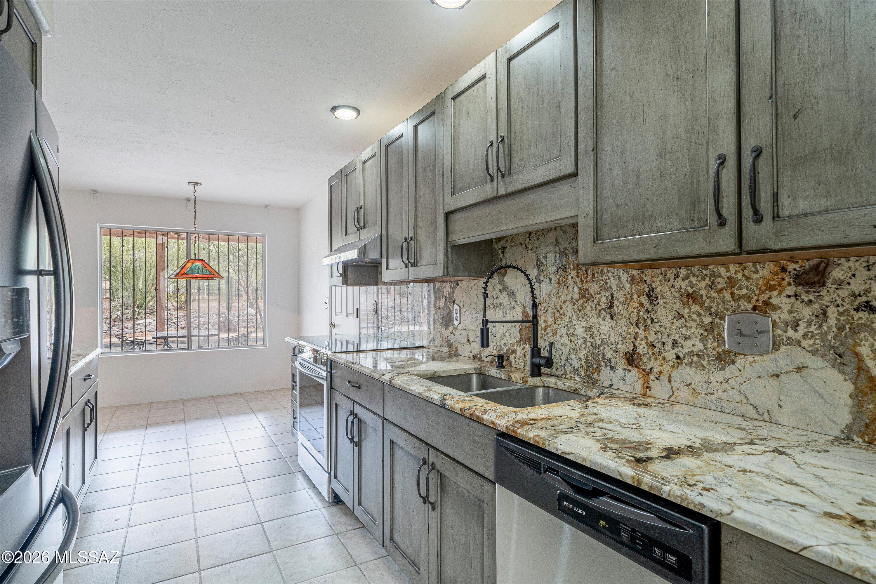 10961 East Roger Road Tucson, AZ 85749 - Photo 32 of 45 New dishwasher