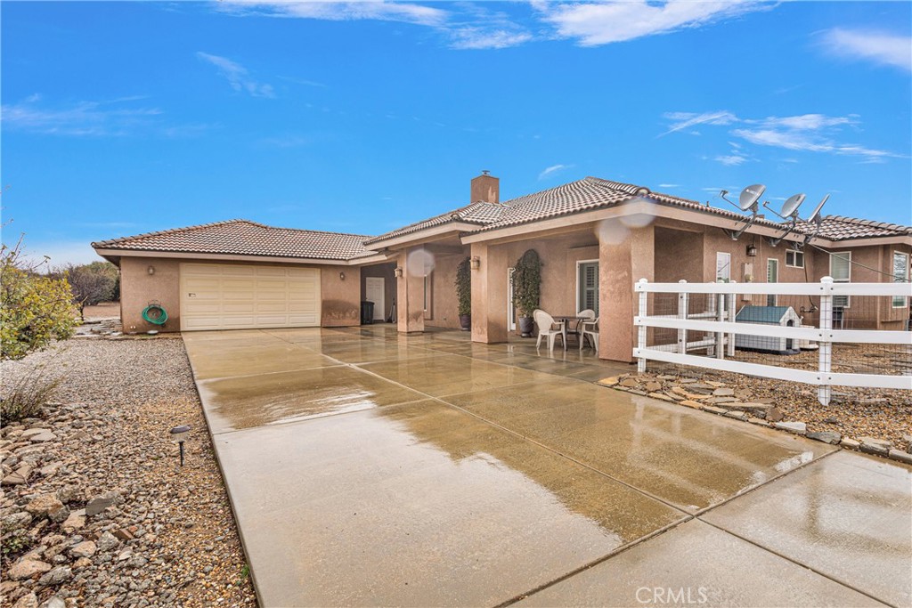 a view of a house with a swimming pool