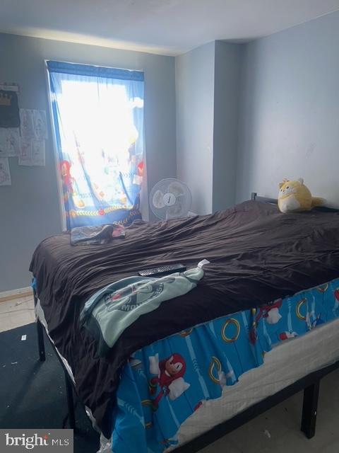 426 Hamilton Street Harrisburg, PA 17102 - Photo 6 of 11 a bedroom with a bed and a window