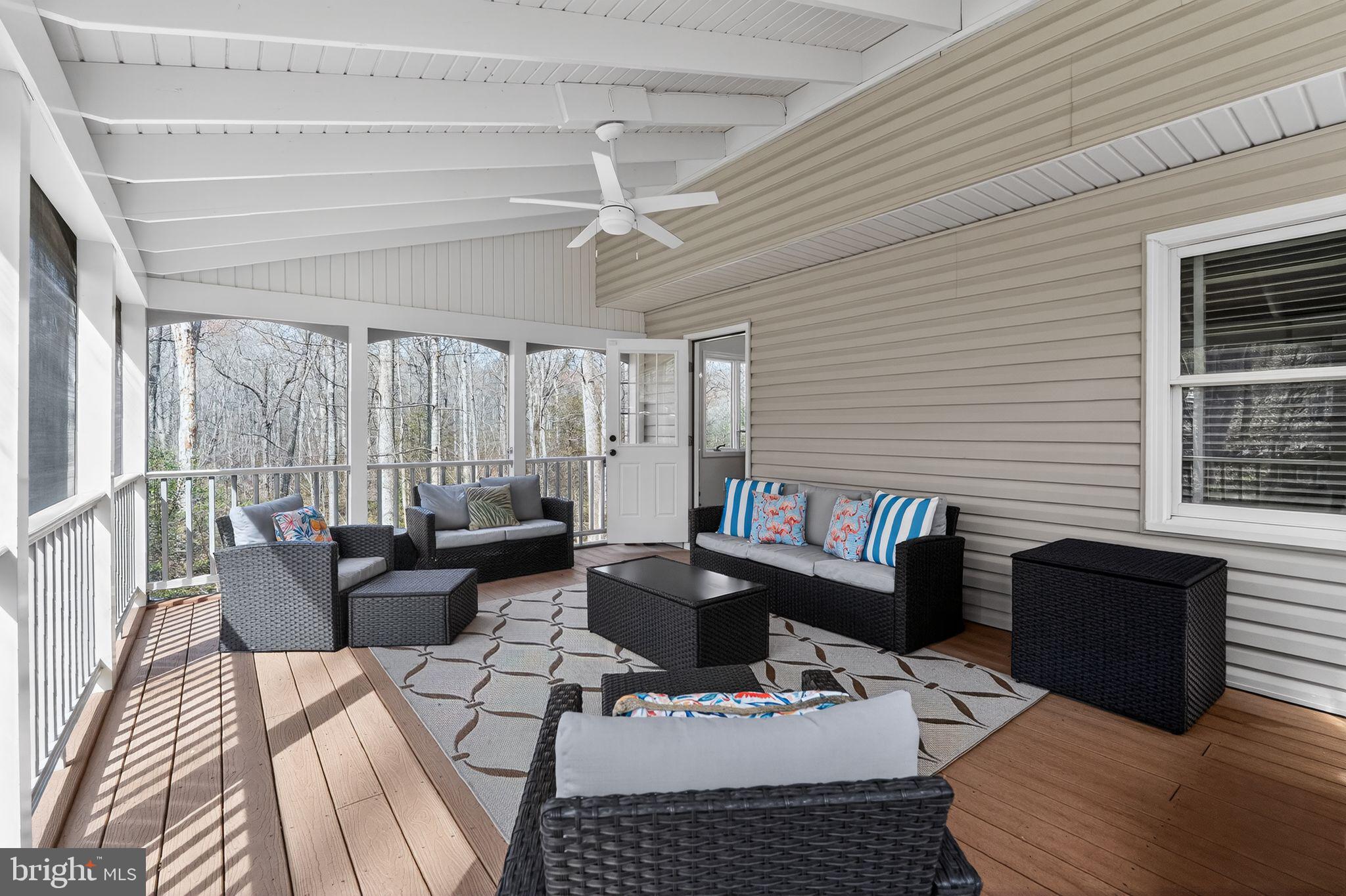 11728 Stuart Mill Road Oakton, VA 22124 - Photo 73 of 88 a living room with furniture and a large window