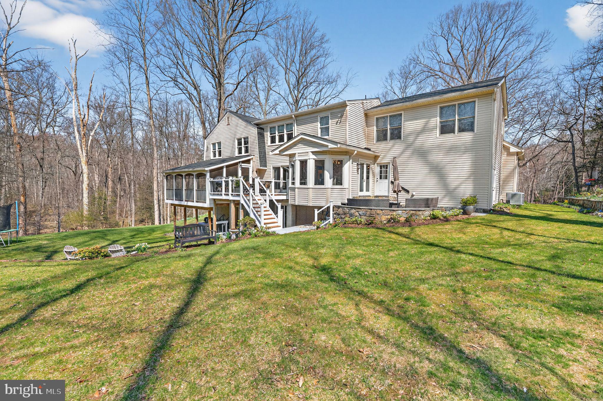 11728 Stuart Mill Road Oakton, VA 22124 - Photo 81 of 88 a front view of a house with a yard