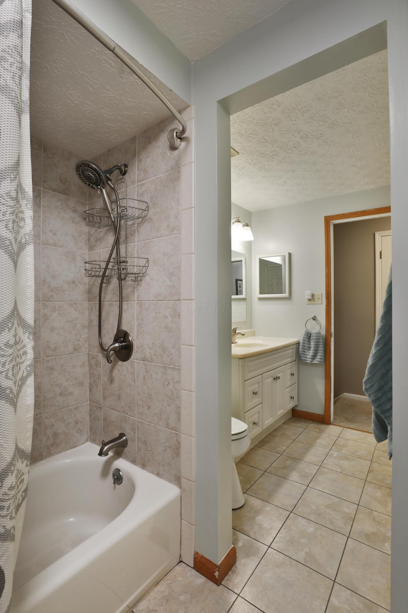 7044 Linworth Road Columbus, OH 43235 - Photo 23 of 48 En suite bathroom