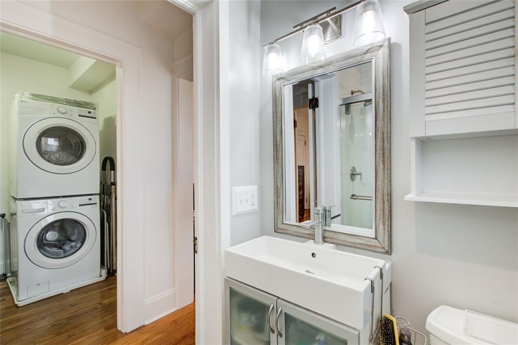 733 Frederica Street Northeast, Unit 12 Atlanta, GA 30306 - Photo 15 of 23 a bathroom with a sink and a washer dryer