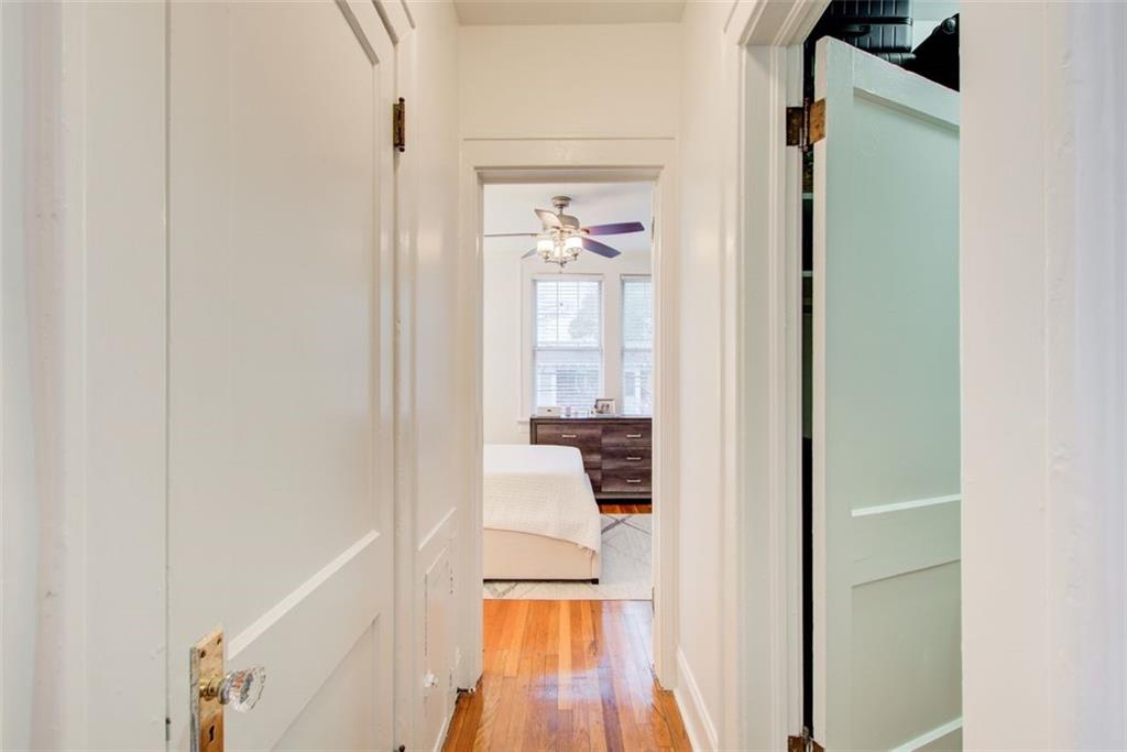 733 Frederica Street Northeast, Unit 12 Atlanta, GA 30306 - Photo 17 of 23 a view of a hallway with wooden floor and a living room