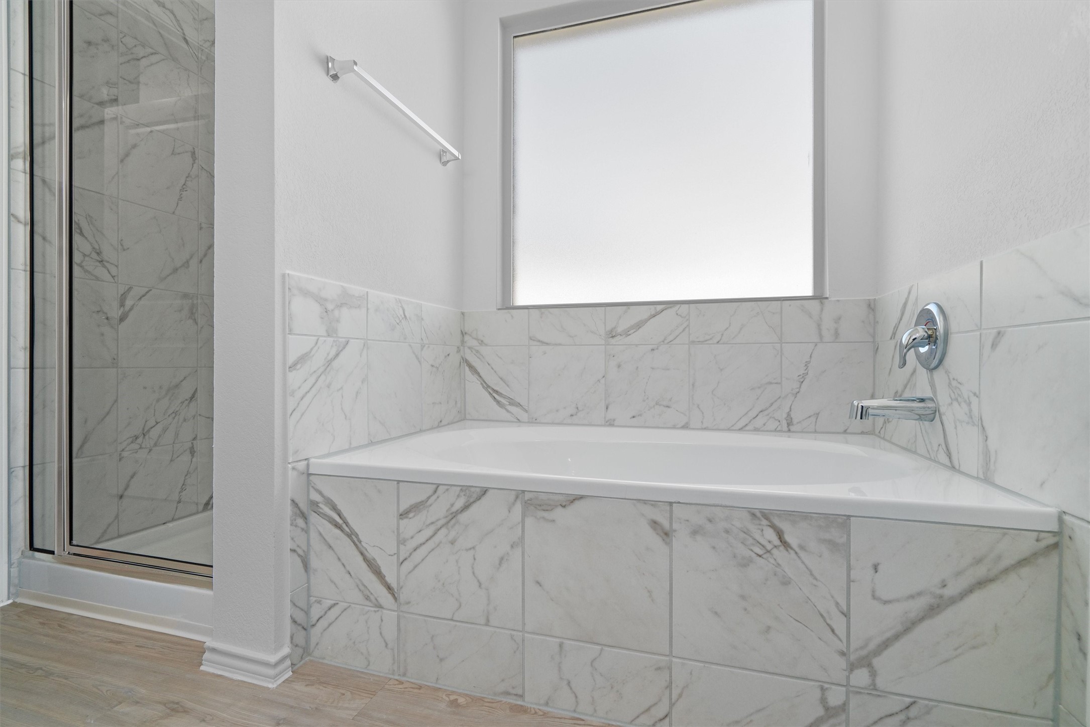 259 Sormonne Loop Kyle, TX 78640 - Photo 17 of 34 a bathroom with a sink and a shower