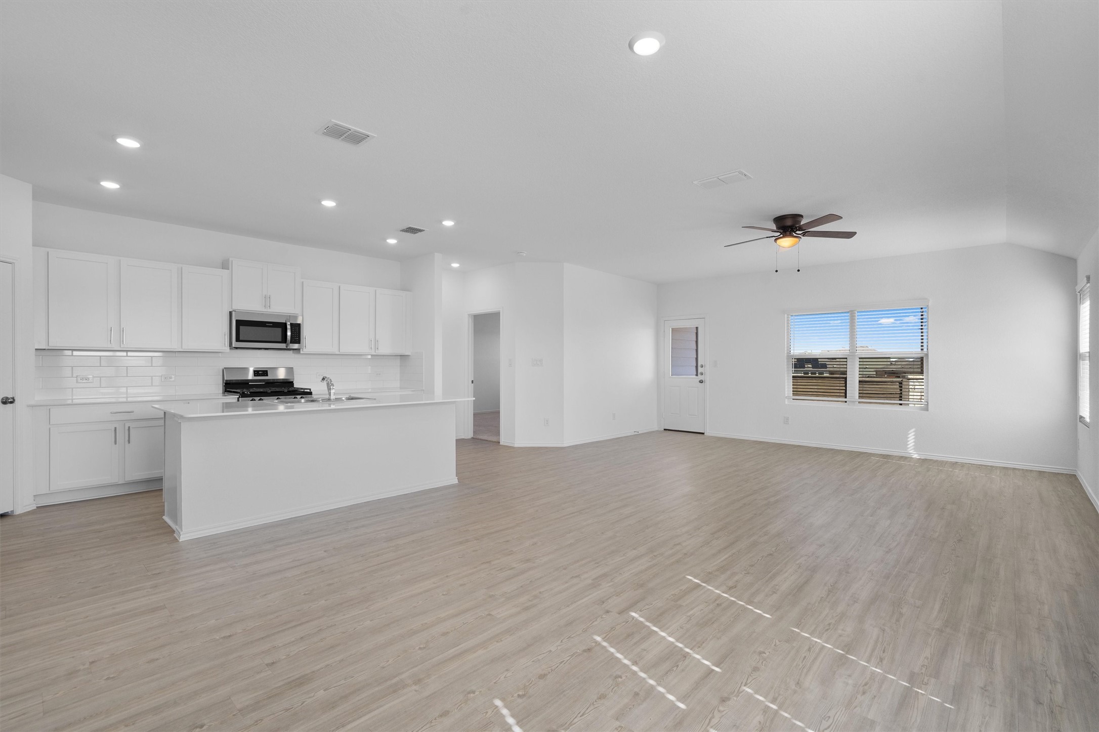 259 Sormonne Loop Kyle, TX 78640 - Photo 34 of 34 a view of kitchen with granite countertop cabinets and refrigerator