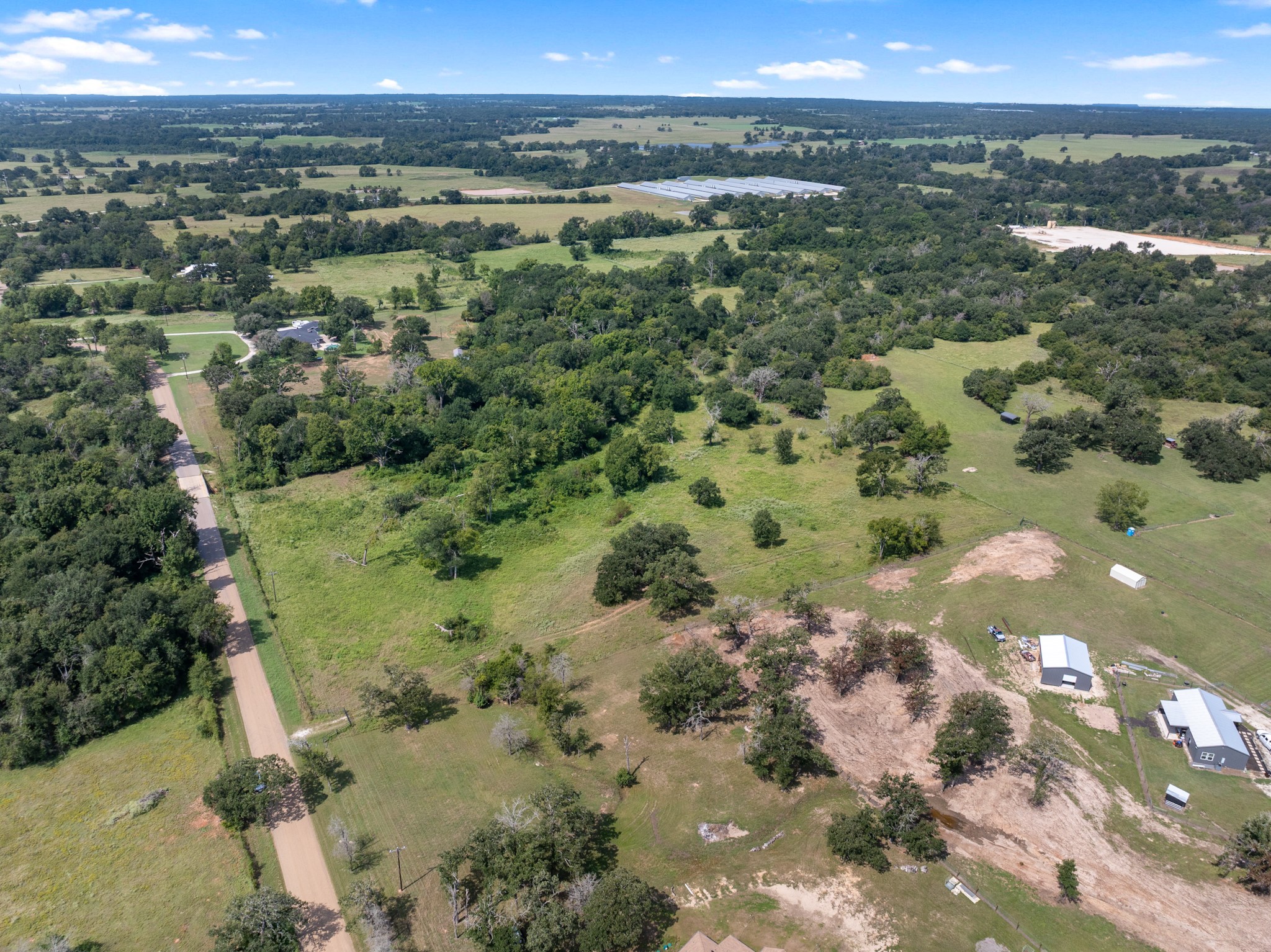 Tbd Cazey Loop Franklin, TX 77856 - Photo 12 of 20 a view of a lake with a city